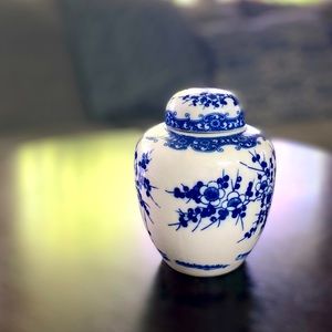 Decorative white and blue vase piece